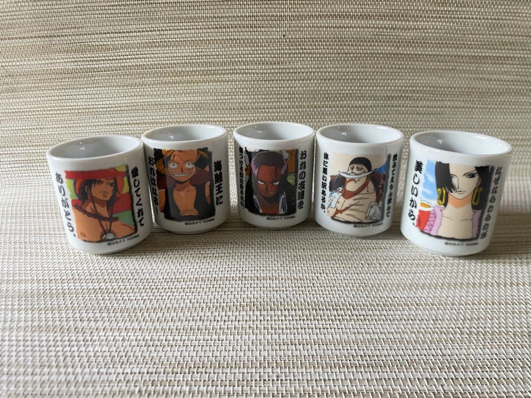 One Piece Anime Ceramic Mini Cups Set (Category: Dinnerware & Cutlery) located in Davao. Submitted by shauitoys2019 (Listing ID 1450242084, Image 1). Description: Has slight tiny chpped one cup.