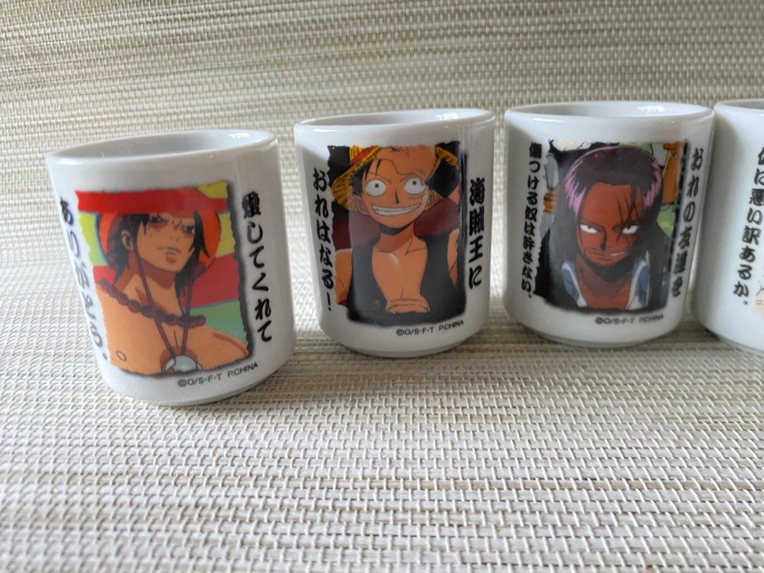 One Piece Anime Ceramic Mini Cups Set (Category: Dinnerware & Cutlery) located in Davao. Submitted by shauitoys2019 (Listing ID 1450242084, Image 2). Description: Has slight tiny chpped one cup.