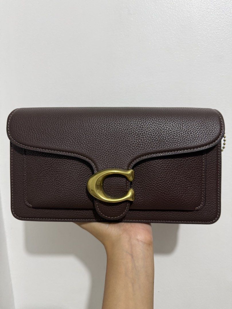 Sale Original Coach Tabby 26 (Maple) (Category: Cross-body Bags) located in Iloilo. Submitted by lovedbysachi (Listing ID 1450228410, Image 2). Description: Move out sale huhu, really have to let go of my babies 😭😭 Note: color may vary due to lighting Used twice only 🥹 • Comes with care card and own dustbag •Brass hardware • Two slings (one short and one long) • Retail item 🤗 #coachtabby #tabby26#maplecoach .