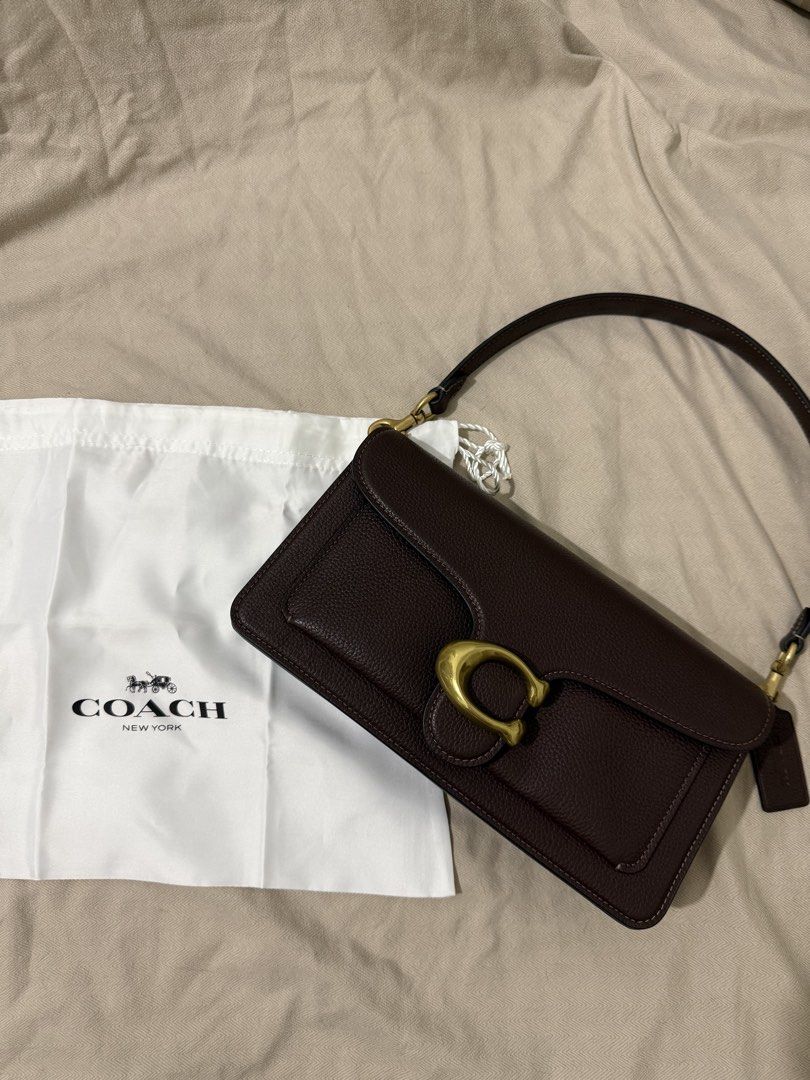 Sale Original Coach Tabby 26 (Maple) (Category: Cross-body Bags) located in Iloilo. Submitted by lovedbysachi (Listing ID 1450228410, Image 1). Description: Move out sale huhu, really have to let go of my babies 😭😭 Note: color may vary due to lighting Used twice only 🥹 • Comes with care card and own dustbag •Brass hardware • Two slings (one short and one long) • Retail item 🤗 #coachtabby #tabby26#maplecoach .