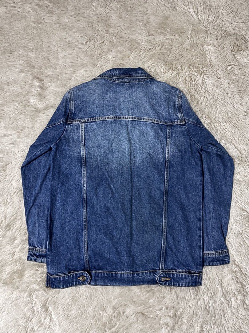 Oversized Blue Denim Jacket (Category: Coats, Jackets and Outerwear) located in Bulacan. Submitted by rin2024 (Listing ID 1450271240, Image 2). Description: Oversized Blue Denim Jacket - With oversized fit - With good quality thick denim cotton - With missing button at the back, unnoticeable in front Payment Method: GCash only. Delivery Options: Lalamove, Grab, or J&T only, with shipping fee shouldered by buyer..
