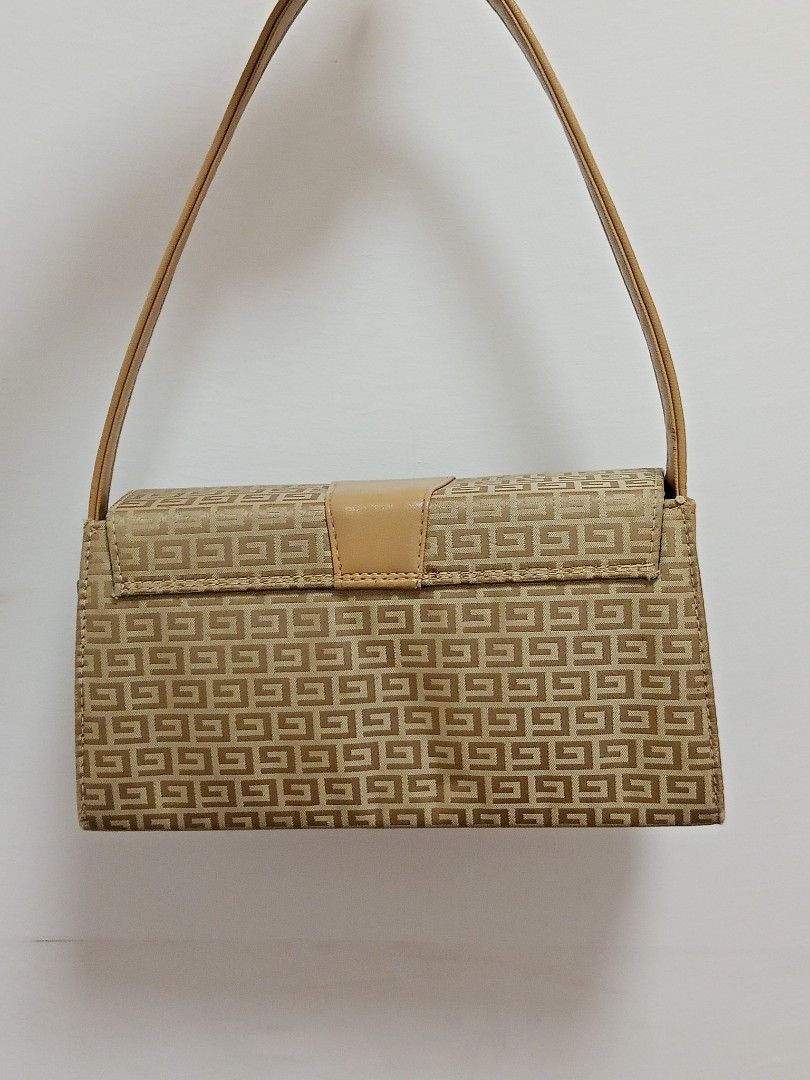 Pierre Balmain Monogram Shoulder Bag (Category: Luxury Bags & Wallets) located in Manila. Submitted by lovedbynabix (Listing ID 1450258498, Image 2). Description: Classic shoulder bag in tan and brown monogram. Features tan leather trim, a small G logo, and multiple interior compartments. Perfect for everyday use..