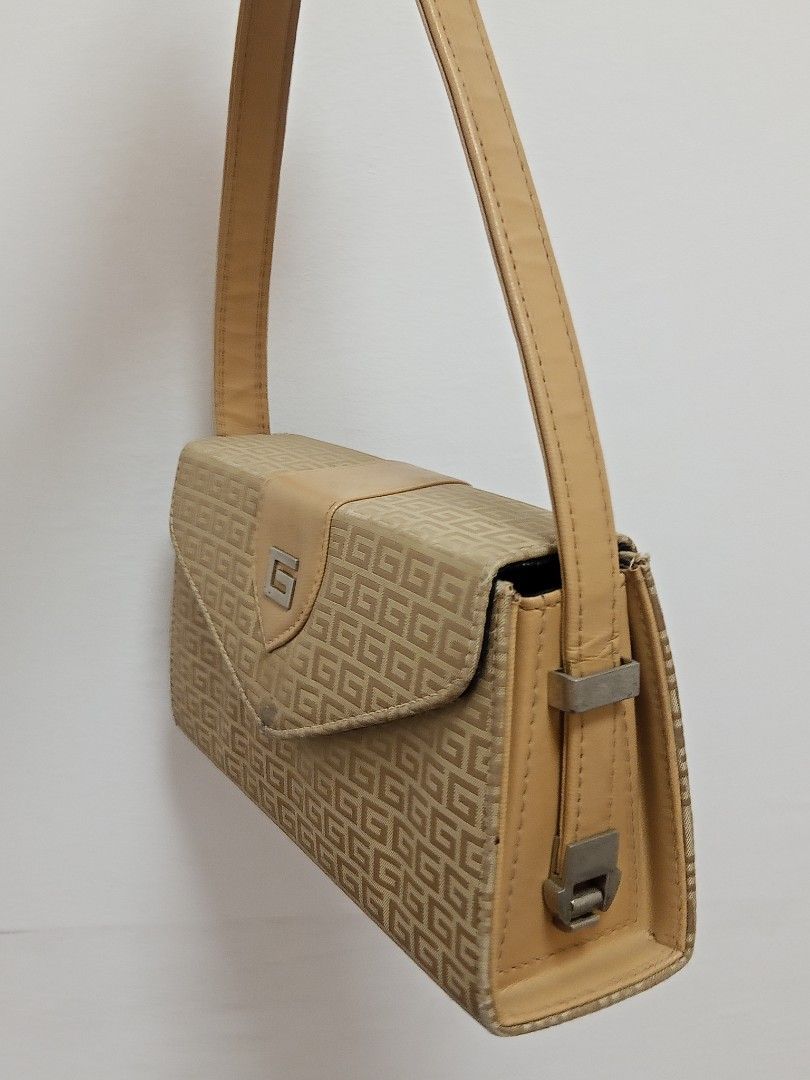 Pierre Balmain Monogram Shoulder Bag (Category: Luxury Bags & Wallets) located in Manila. Submitted by lovedbynabix (Listing ID 1450258498, Image 3). Description: Classic shoulder bag in tan and brown monogram. Features tan leather trim, a small G logo, and multiple interior compartments. Perfect for everyday use..