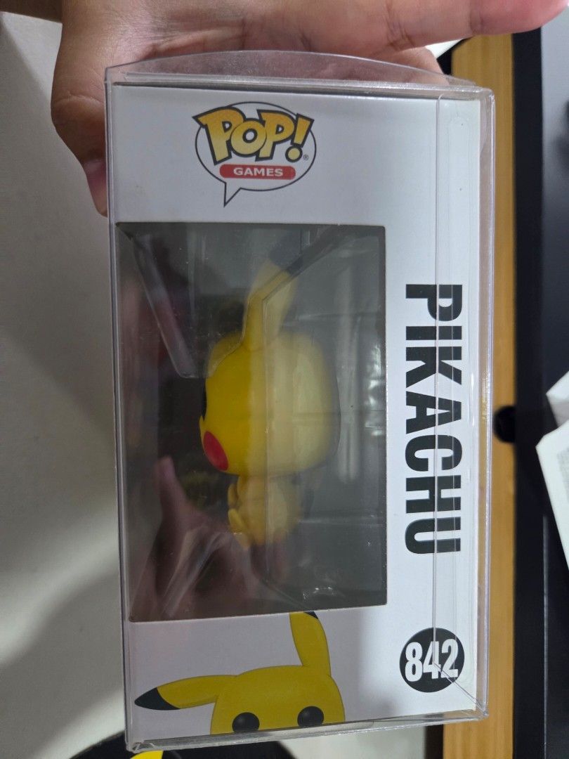 Pokemon Funko Pop (Pikachu) (Category: Designer & Blind Box Toys) located in Quezon City. Submitted by panchie32 (Listing ID 1450266457, Image 3). Description: Please refer to photo for item's condition. Note that item has an outer cover/case included. I do not open my Funko Pops. As soon as I got this, I placed it inside a protective outer cover and displayed it on my shelf. The figure itself has never been removed from the box or handled. 📍 Lo
