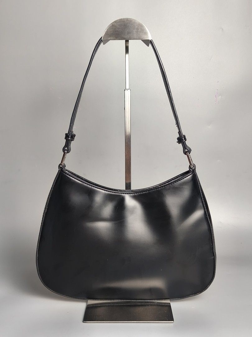 Prada Black Cleo Shoulder Bag (Category: Luxury Bags & Wallets) located in Bulacan. Submitted by 4kcollection (Listing ID 1450140487, Image 2). Description: Prada Black Cleo Shoulder Bag Excellent Condition Size: Small White tag #170 Sobrang Nice 💖 Dm for sure buyer 📩 MOP: Gcash / Maya / BPI Courier: J&t / Lbc / Lalamove Location: SJDM Bulacan.