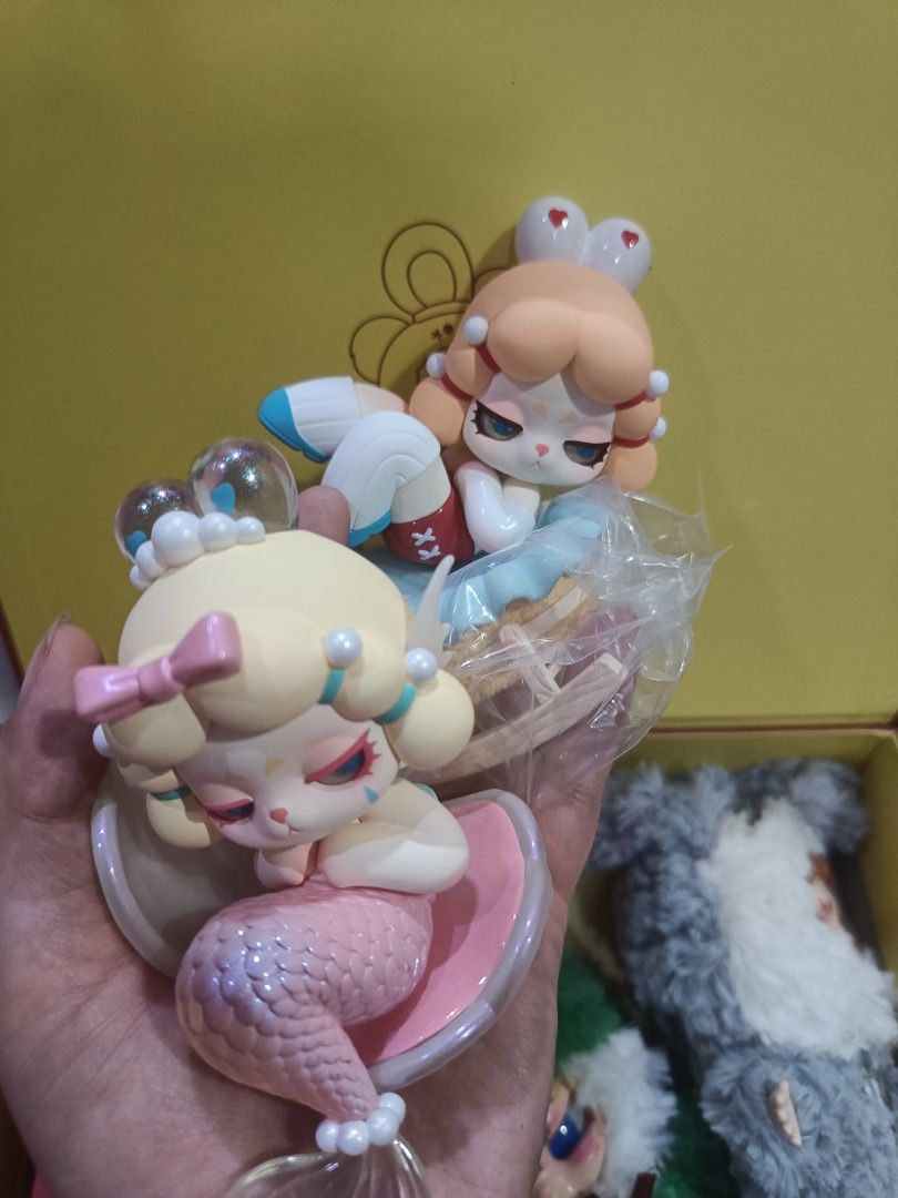 (Pre loved) AYOR TOYS "Shining" Blind Box Set - Rabbit & Frog Figures (Category: Toys & Games) located in Alor Setar. Submitted by quineez (Listing ID 1450156976, Image 3). Description: - AYOR TOYS "Shining" Blind Box Set - Includes main rabbit figure - Comes with 2 small plushies: 1 grey bunny, 1 green frog - Includes 2 collectible cards: "Tears of the Mermaid" and "The Lullaby" - Ideal for collectors! + Authentic + Price including for all and a