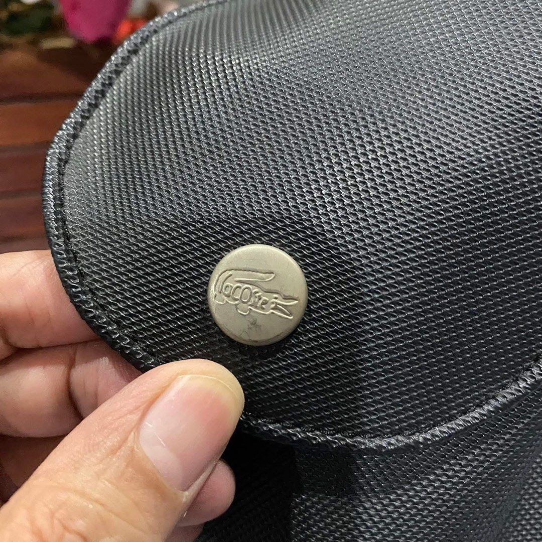 Preloved Lacoste Lora Shoulder Bag – Black (Category: Luxury Bags & Wallets) located in Binmaley. Submitted by kuriiisuuu (Listing ID 1450313374, Image 3). Description: Preloved Lacoste Lora Shoulder Bag – Black ✨ Preloved — kindly manage expectations po since this is a used item. Authenticity is not guaranteed. Buy at your own risk. 📌 Type: Shoulder Bag 📌 Details: • Lacoste Lora Shoulder Bag • Classic black color • Prominent rubber Lacoste log