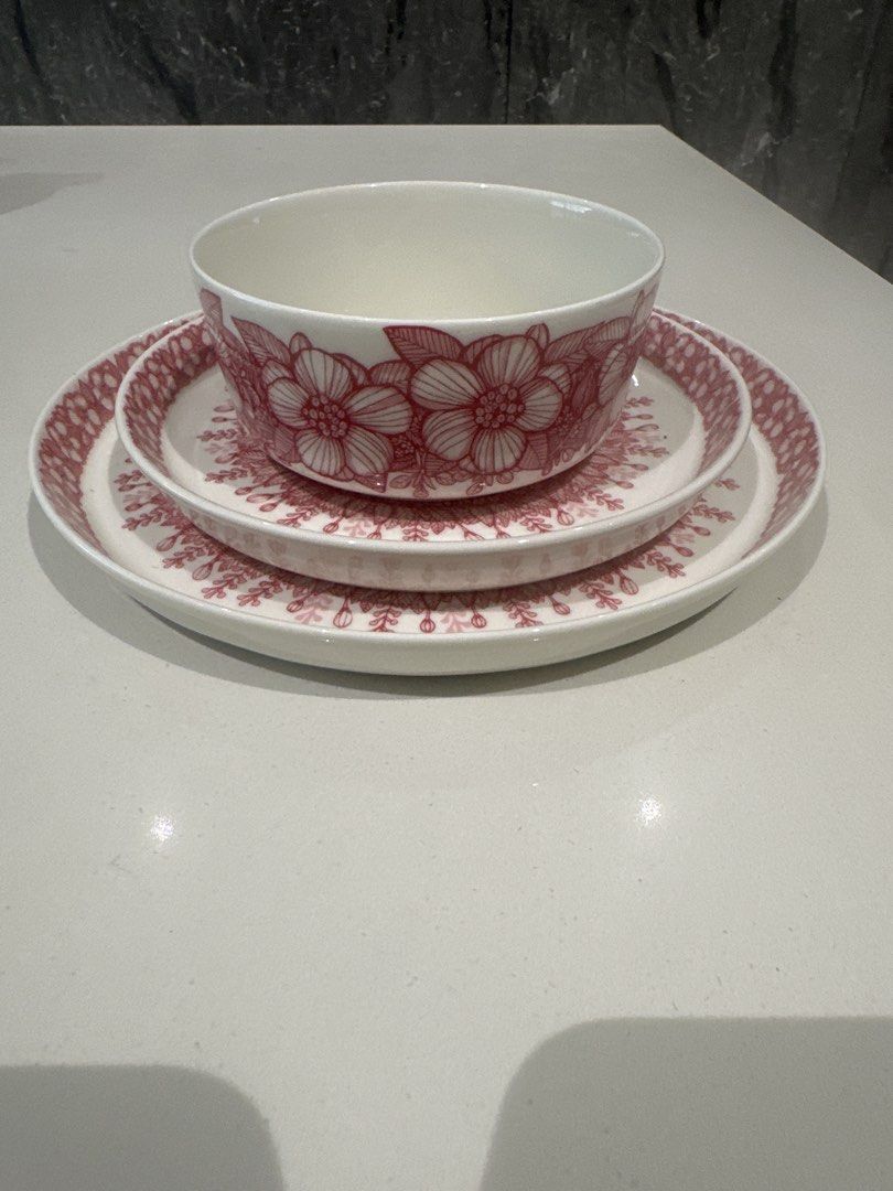 Red Floral Pattern Bowl and Plates Set (Category: Dinnerware & Cutlery) located in Kuala Lumpur. Submitted by Machi (Listing ID 1450230372, Image 1). Description: - Arabia -Beautiful red floral pattern on white ceramic. - Set includes: 1 bowl and 2 plates. - Bowl features floral design on the outside. - Plates have a central floral mandala design with a decorative border. - Ideal for serving food or as decorative pieces. - Adds a vibrant pop of c