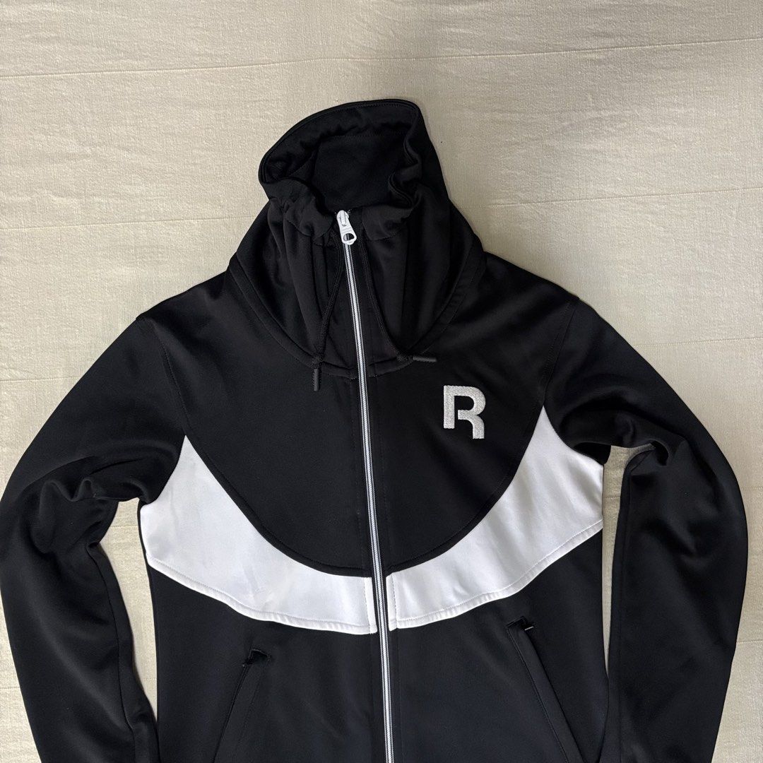 Reebok Black White Track/Running Jacket Zip Up Size M (Category: Coats, Jackets and Outerwear) located in Dasmarinas. Submitted by 8ocho8 (Listing ID 1450279387, Image 2). Description: - Reebok Track Jacket - Color: Black and White - Size: Medium (M) - Features: Full zip closure, front pockets - Collar: Can be zipped high or folded down - Ideal for: Casual wear, light workouts Measurements: W: 17in L: 24in Sleeve: 23in.