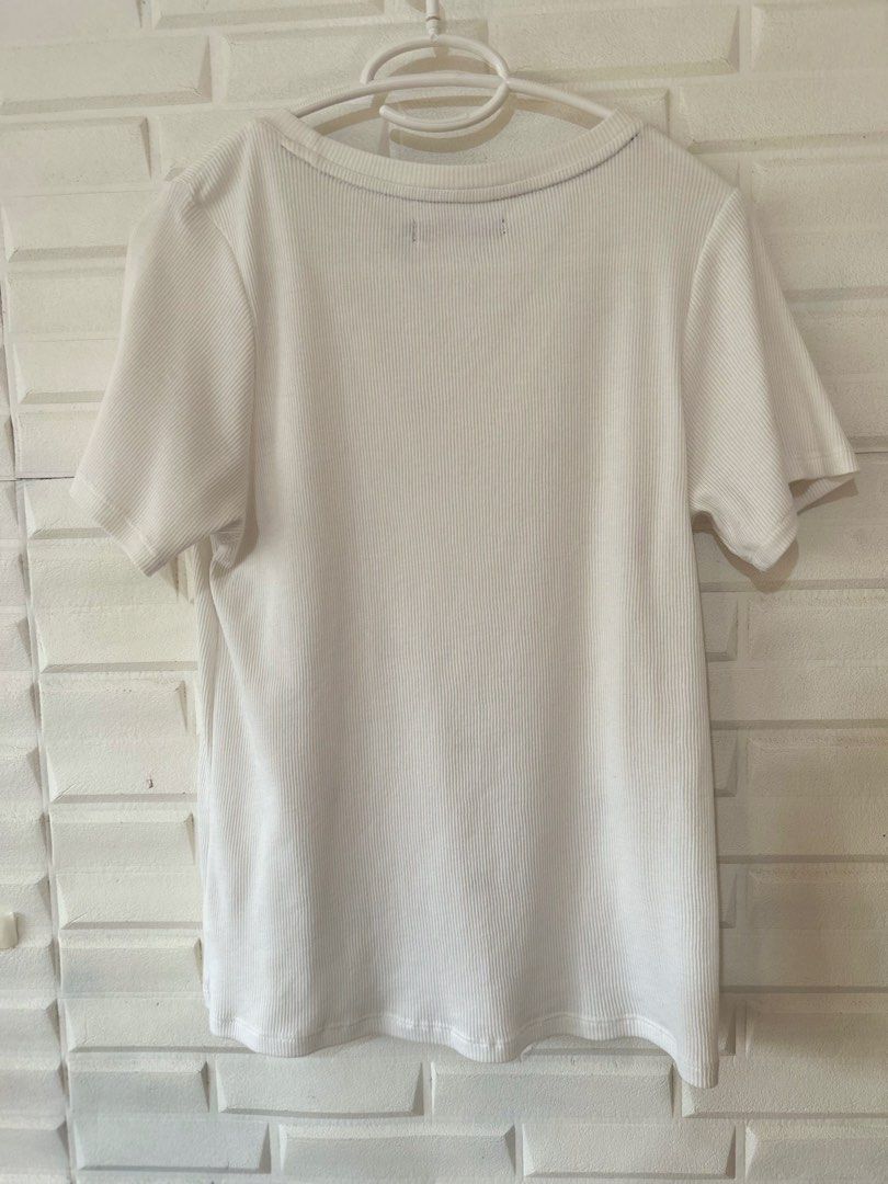 Regatta blouse (Category: Blouses) located in Marikina City. Submitted by decluttering.matters (Listing ID 1450231672, Image 2). Description: ‼️ Please read the details and terms and inspect all the photos Regatta blouse (knit / ribbed) Size: L (loose fit) Color: Off-white with embroidered red hearts Small stain (see last photo) No reservations. Payment first via GCash Shipping will be arranged and paid by the buyer. Preferably Grab or Lalamove F