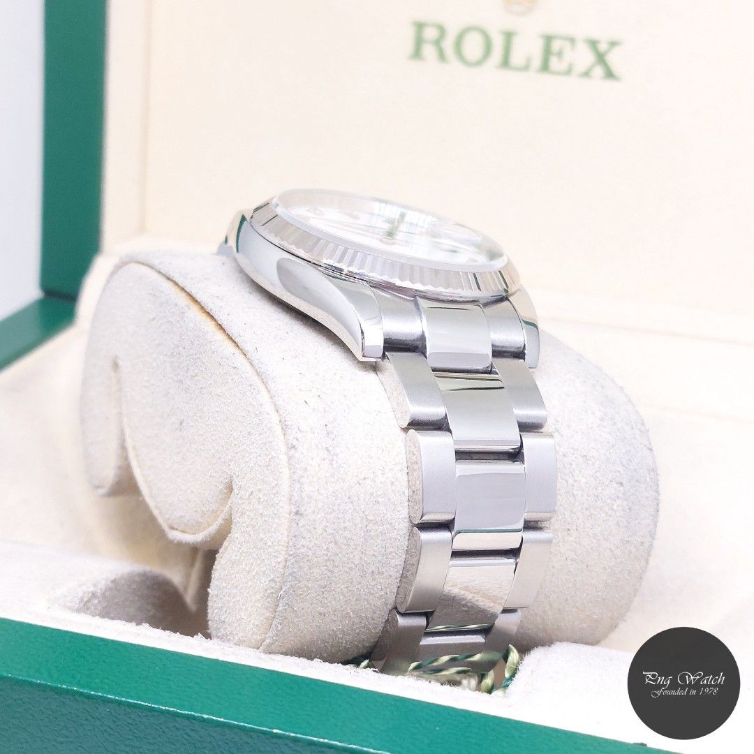 Rolex 34mm White Diamonds Dial Oyster Perpetual Date REF: 115234 (Box, Cert & Tags-2014) (Category: Watches) located in Singapore. Submitted by pngwatchdealer (Listing ID 1450251150, Image 3). Description: [SPECIFICATIONS] **Watch comes in full option (Box, Cert & Tags)** **Straight bracelet** Brand: Rolex Model: Oyster Perpetual Date 34mm White Diamonds Dial (REF: 115234)(AN)(14)(O) Movement: Automatic (Self-Winding) Functions and Features: Date