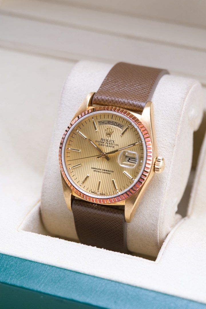 Rolex Day-Date 18038 (Category: Luxury Watches) located in Quezon City. Submitted by awristotell (Listing ID 1450249227, Image 1). Description: “New WRISTwatch to TELL” Rolex Day-Date 18038 A rare example of vintage aging done right—the fluted bezel has taken on a gorgeous honey-bronze hue that complements the champagne tapestry dial perfectly Mint Unpolished Condition Price: 598,000 PHP Ref: 18038 Year: 1986 Movement: Automatic Crystal: Sapphire