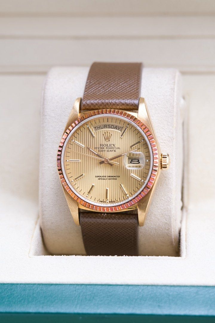 Rolex Day-Date 18038 (Category: Luxury Watches) located in Quezon City. Submitted by awristotell (Listing ID 1450249227, Image 2). Description: “New WRISTwatch to TELL” Rolex Day-Date 18038 A rare example of vintage aging done right—the fluted bezel has taken on a gorgeous honey-bronze hue that complements the champagne tapestry dial perfectly Mint Unpolished Condition Price: 598,000 PHP Ref: 18038 Year: 1986 Movement: Automatic Crystal: Sapphire