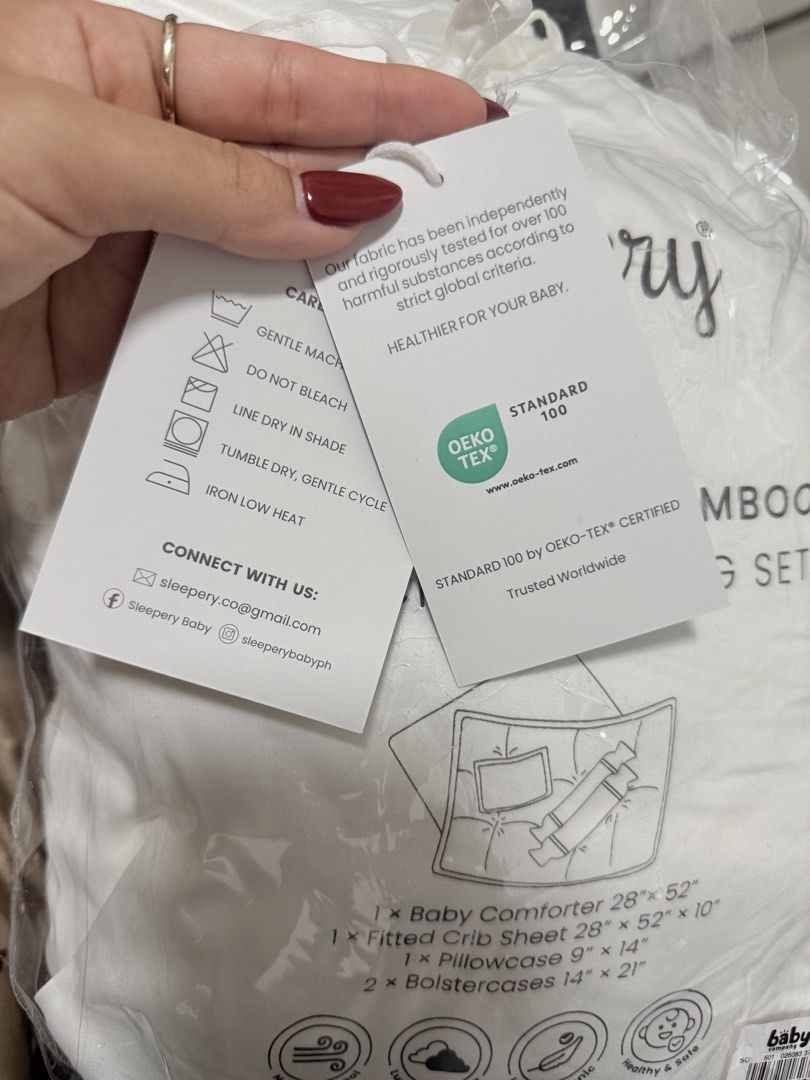 Sleepery 100% Organic Bamboo Baby Crib Bedding Set (Category: Cots & Cribs) located in Manila. Submitted by prettyasian_28 (Listing ID 1450189636, Image 2). Description: Selling a 100% organic bamboo baby crib bedding set from Sleepery. Includes 1 baby comforter (28"x52"), 1 fitted crib sheet (28"x52"x10"), 1 pillowcase (9"x14"), and 2 bolster cases (14"x21"). Fabric is OEKO-TEX certified, tested for harmful substances. Hypoallergenic, healthy, a