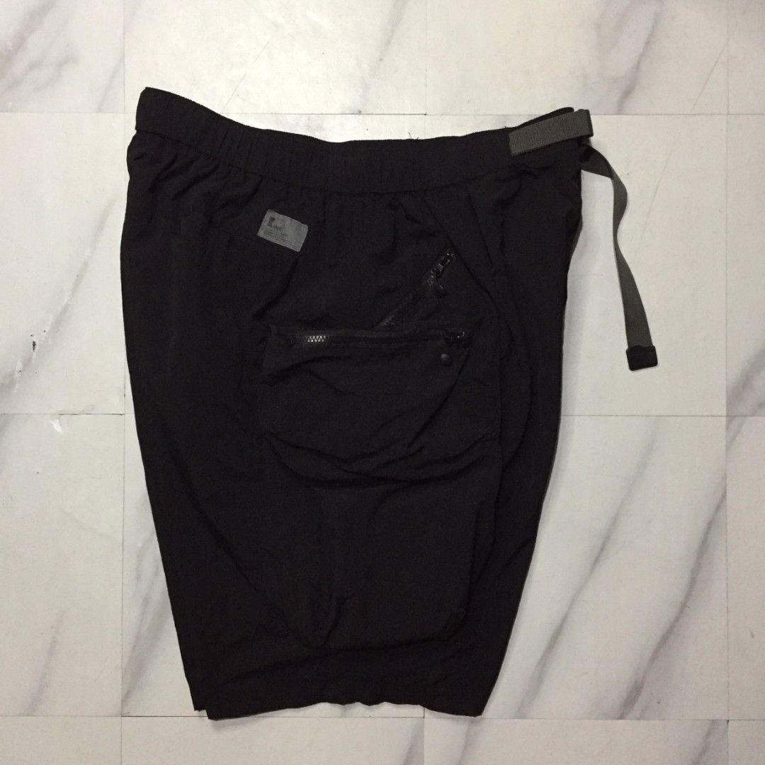 SMKL Black Cargo Shorts with Belt (Category: Shorts) located in Imus. Submitted by thrifts_select (Listing ID 1450152964, Image 3). Description: - SMKL Black Cargo Shorts - Elastic waistband with adjustable belt - Multiple zippered pockets (front and sides) - Ideal for everyday wear and outdoor activities - Comfortable and functional design waist 36 adjustable Length 23.
