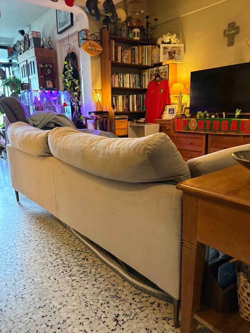 Sofa (Category: Sofas) located in Singapore. Submitted by heyyo5678 (Listing ID 1450165466, Image 3). Description: - Comfortable three-seater sofa - Light grey fabric - Modern design with slim legs - Spacious for lounging - Soft and plush cushions - Ideal for living rooms or common areas - Selling due to space constraints.