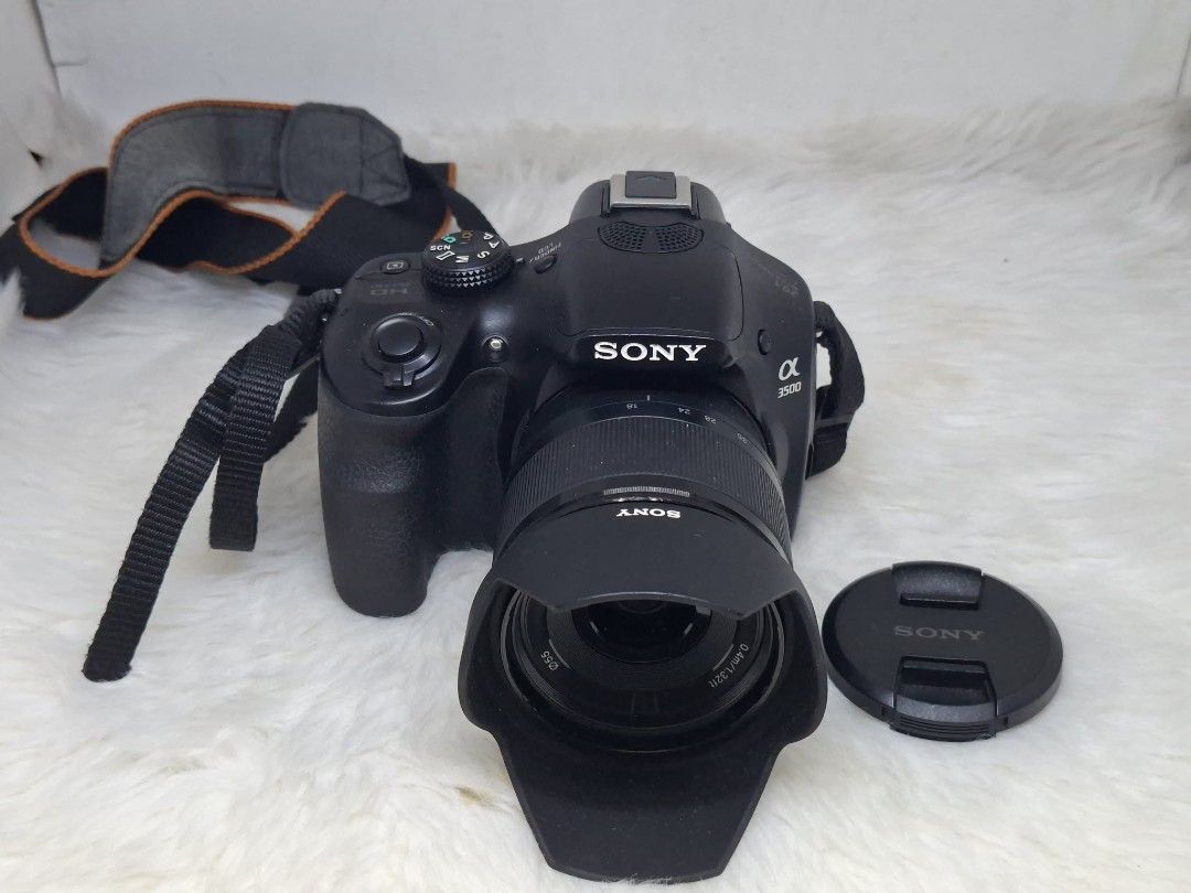 sony a3500 with 18-55mm lens mirrorless camera (Category: Cameras) located in Manila. Submitted by ultimogizmos (Listing ID 1450188250, Image 1). Description: sony a3500 with 18-55mm lens mirrorless camera Sensor: 20.1MP Exmor APS HD CMOS sensor. ISO Range: 100 - 16,000. Autofocus: 25-point contrast-detect system. Viewfinder: Tru-Finder Electronic Viewfinder (EVF). LCD Screen: 3.0-inch display (230k-dot resolution). Video: Full HD 1080p recording