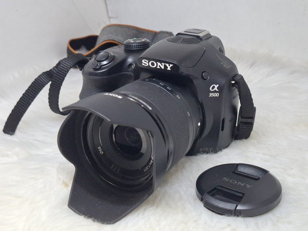 sony a3500 with 18-55mm lens mirrorless camera (Category: Cameras) located in Manila. Submitted by ultimogizmos (Listing ID 1450188250, Image 2). Description: sony a3500 with 18-55mm lens mirrorless camera Sensor: 20.1MP Exmor APS HD CMOS sensor. ISO Range: 100 - 16,000. Autofocus: 25-point contrast-detect system. Viewfinder: Tru-Finder Electronic Viewfinder (EVF). LCD Screen: 3.0-inch display (230k-dot resolution). Video: Full HD 1080p recording