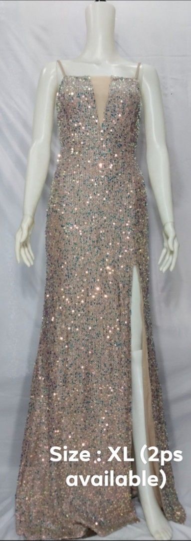 Sparkly Sequin Gown with High Slit - Size XL (Category: Evening dresses & gowns) located in Pasig City. Submitted by itsmery (Listing ID 1450280823, Image 1). Description: - Elegant sequin gown - Flattering V-neckline - Chic high slit - Delicate thin straps - Available in Size XL (2 pieces) - Ideal for parties and formal events - Message me for any questions.