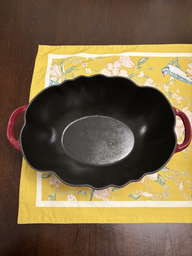 Staub Tomato Enameled Cast Iron Dutch Oven (Category: Cookware & Accessories) located in Kuala Lumpur. Submitted by harithniall (Listing ID 1450272155, Image 3). Description: - Staub Tomato-shaped Dutch Oven - Color: Vibrant Red exterior, classic Black interior - Size: 25cm (9 7/8") - Origin: Made in France - Versatile: Ideal for both cooking and serving - Kitchen Decor: Adds a fun pop of color and charm.