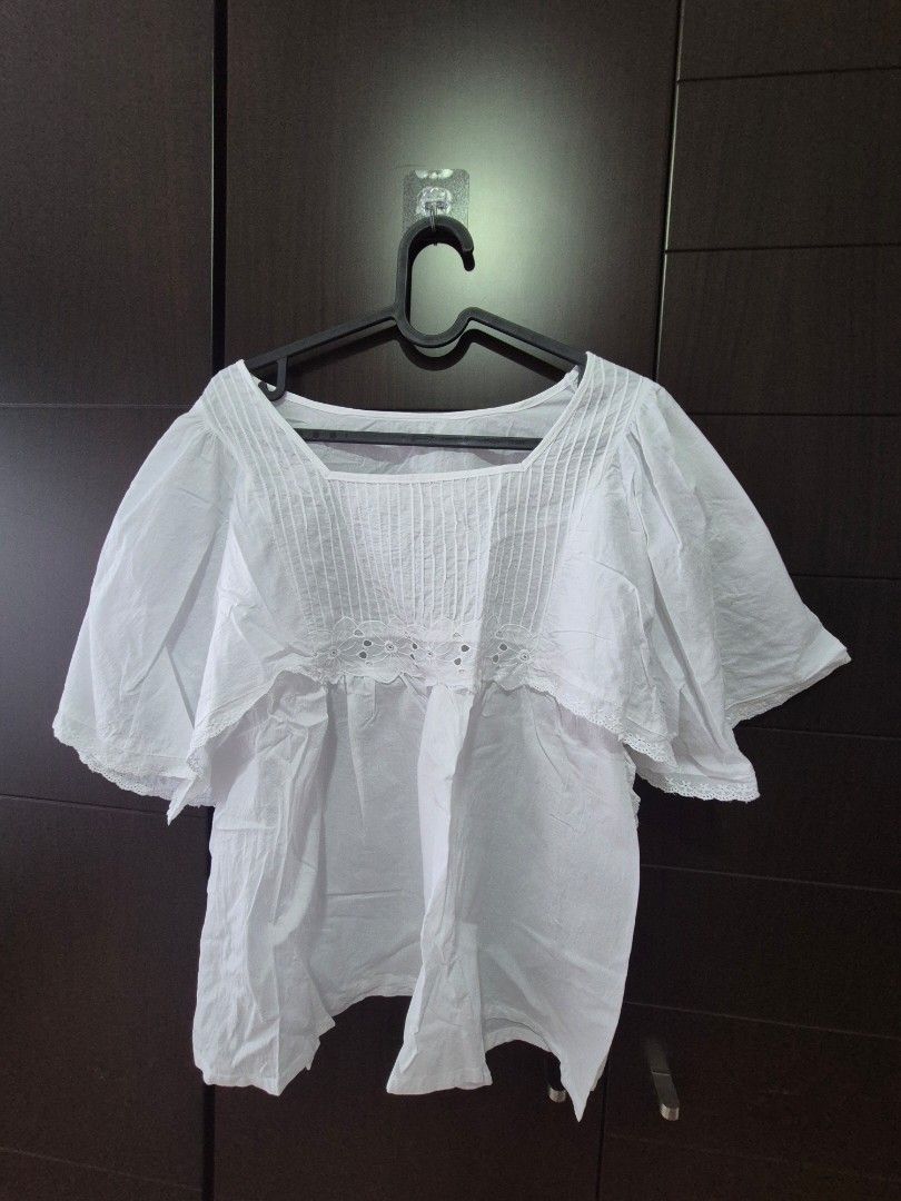 Tops (Category: Blouses) located in Singapore. Submitted by dodocrafty (Listing ID 1450222913, Image 3). Description: Hii first black top is (xs) the 2 white tops (free size) the flowerly top (free size) .