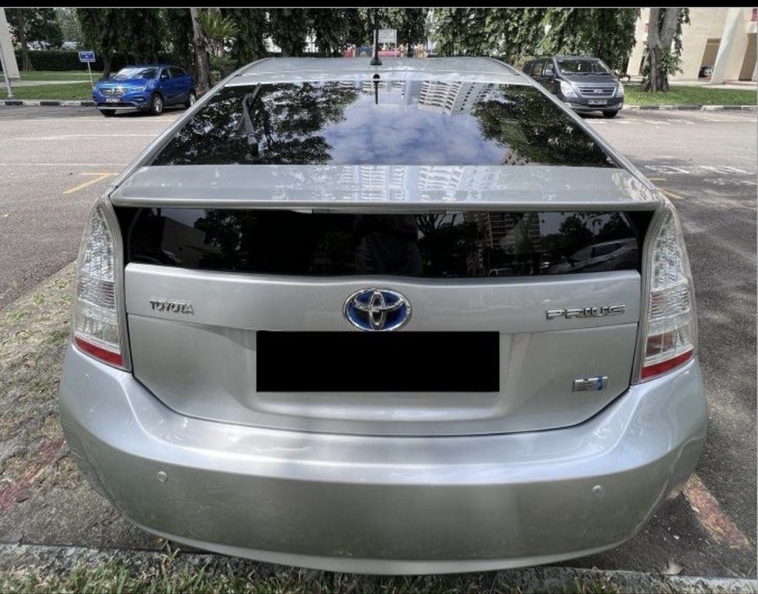 Toyota Prius Hybrid 1.8 (A) (Category: Used Cars) located in Singapore. Submitted by nel_ng (Listing ID 1450316130, Image 2). Description: Well-maintained 2010 sliver Toyota Prius Hybrid with up to 800+km per full tank. Regularly serviced, with replacement of original new Toyota Hybrid battery pack installed in Apr 2024. Spacious hatchback with large boot, smooth and quiet drive, low maintenance costs, and ideal for families or daily commuting. C