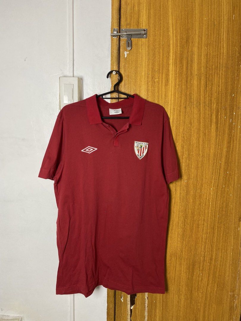 Umbro Athletic Bilbao Polo Shirt (Category: Tshirts & Polo Shirts ) located in Meycauayan. Submitted by arkibo (Listing ID 1450308499, Image 1). Description: - Red Umbro polo shirt - Features the official Athletic Bilbao crest - Size: L (GB/EUR), XL (Asia) - Ideal for casual outings or supporting your team - Classic and versatile design 9/10 Needs washing.