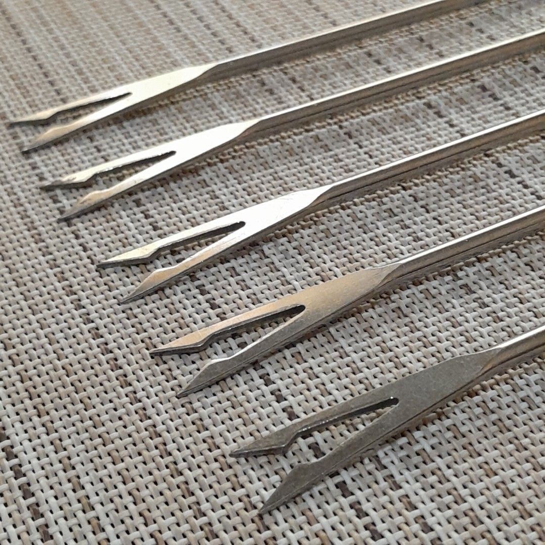 Vintage Fondue Forks (Category: Dinnerware & Cutlery) located in Las Pinas. Submitted by 84vintage (Listing ID 1450203074, Image 3). Description: Sold As set. As Is Where Is Only. These vintage fondue forks feature dark teak wooden handles and stainless steel shafts. Each fork is tipped with a distinct colored plastic button to identify individual users during a meal. The set is suitable for dipping fruit, meat, brownies, or marshmallows into che