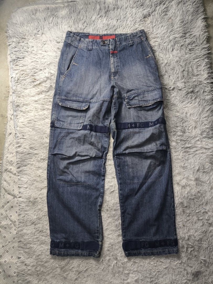VINTAGE MARITHE FRANCOIS GIRBAUD Denim Cargo Jeans Size 34M (Category: Jeans) located in Tibiao. Submitted by simjulian13893 (Listing ID 1450235892, Image 1). Description: - Marithe Francois Girbaud denim jeans - Cargo style with unique strap details - Classic blue wash - 100% cotton - Size: 34M - Ideal for a casual streetwear look.