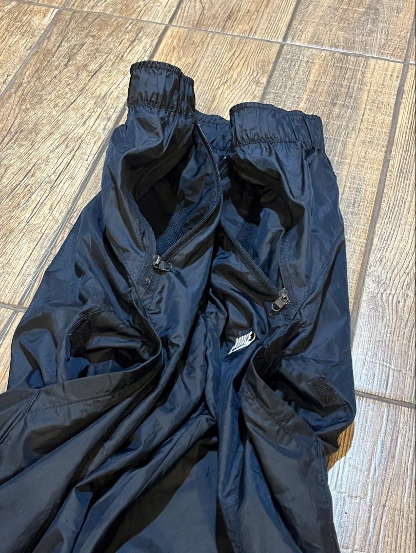 Vintage Nike Trackpants Double Swoosh (Category: Trousers) located in Dagupan City. Submitted by harvey2005 (Listing ID 1450149037, Image 3). Description: Vintage Nike Trackpants Double Swoosh 4 pockets 28-34waist 40-41 Length need wash issues: 2 unnoticeable pin holes, and broken toggle stopper due to its age(replaced bnew one) .