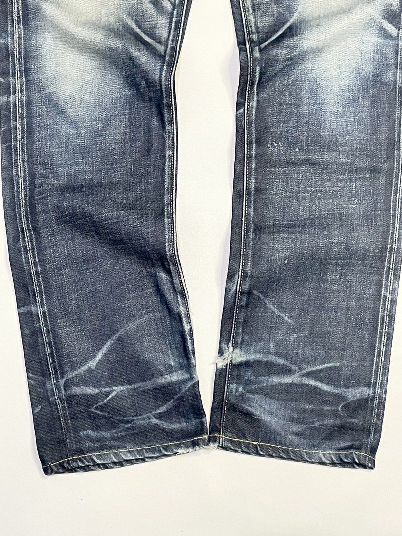 Visvim Phyton Lebel Clawmark Denim (Category: Jeans) located in Bauang. Submitted by paringaoseven (Listing ID 1450297111, Image 2). Description: Distressed Condition: 10/10 Dimensions Waistline: 30 Length: 42” Rise Length: 11.5” Thighs: 11” Inseam: 31” Leg opening: 7.8” - Selvedge denim jeans - Distressed wash with fading and whiskering - Button fly closure - Some wear on hems - Small rip on coin pocket .