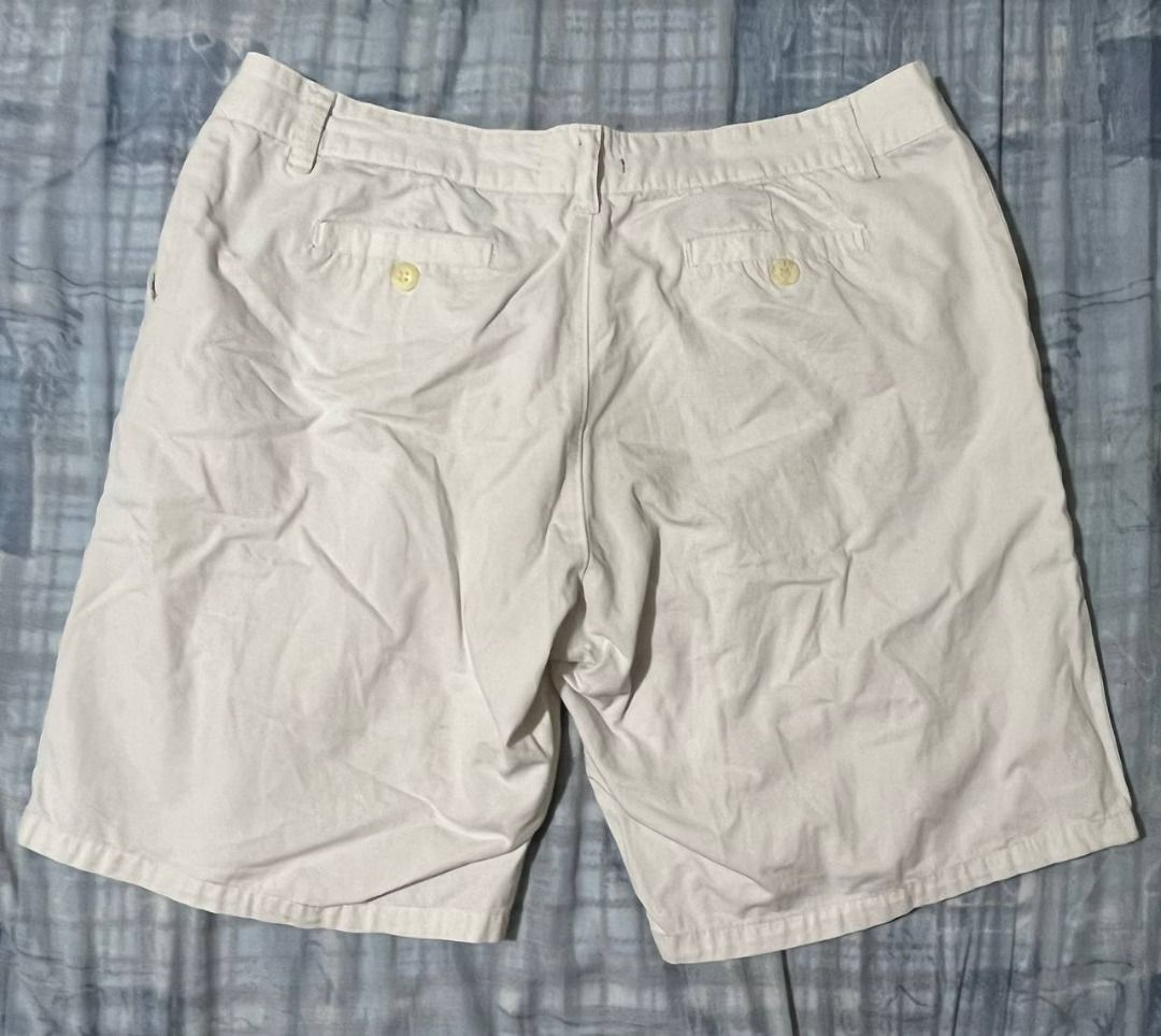 White Chino Shorts (Category: Shorts) located in Las Pinas. Submitted by refo1d.studio (Listing ID 1450286913, Image 2). Description: - Classic white chino shorts - Button and zip front closure - Two back pockets - Comfortable for everyday wear - Versatile wardrobe staple.