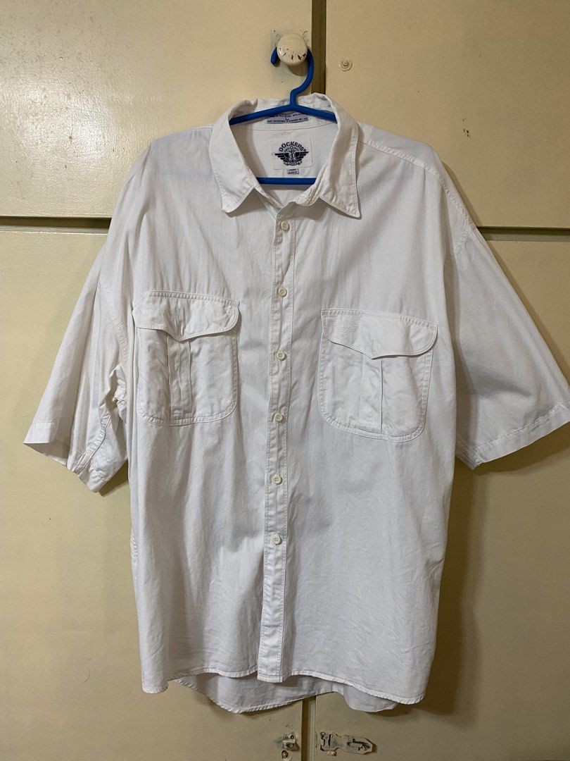 White dockers two pockets short sleeve shirt (Category: Formal Shirts) located in Calamba. Submitted by matthymattiu (Listing ID 1450184963, Image 1). Description: .