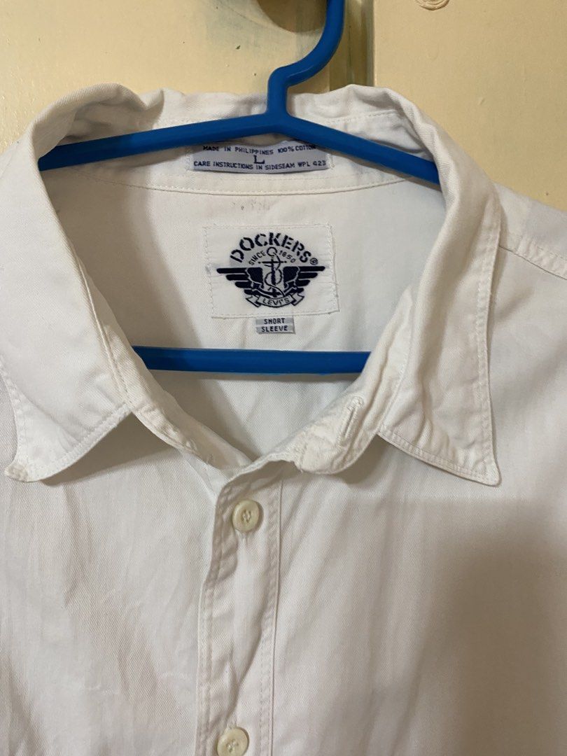 White dockers two pockets short sleeve shirt (Category: Formal Shirts) located in Calamba. Submitted by matthymattiu (Listing ID 1450184963, Image 2). Description: .