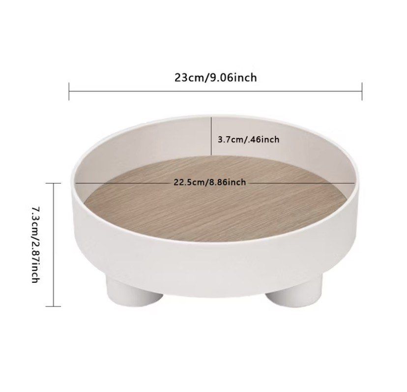White Rotating Storage Tray with Wood Grain Insert (Category: Storage Boxes & Baskets) located in Taguig. Submitted by ceej0915 (Listing ID 1450284861, Image 2). Description: - White rotating tray with a stylish wood grain insert. - Dimensions: 23cm diameter, 7.3cm height. - Ideal for organizing countertops, vanities, and desks. - Versatile storage for perfumes, skincare, decor, or spices. - Smooth 360° rotation for easy access to your items. - A