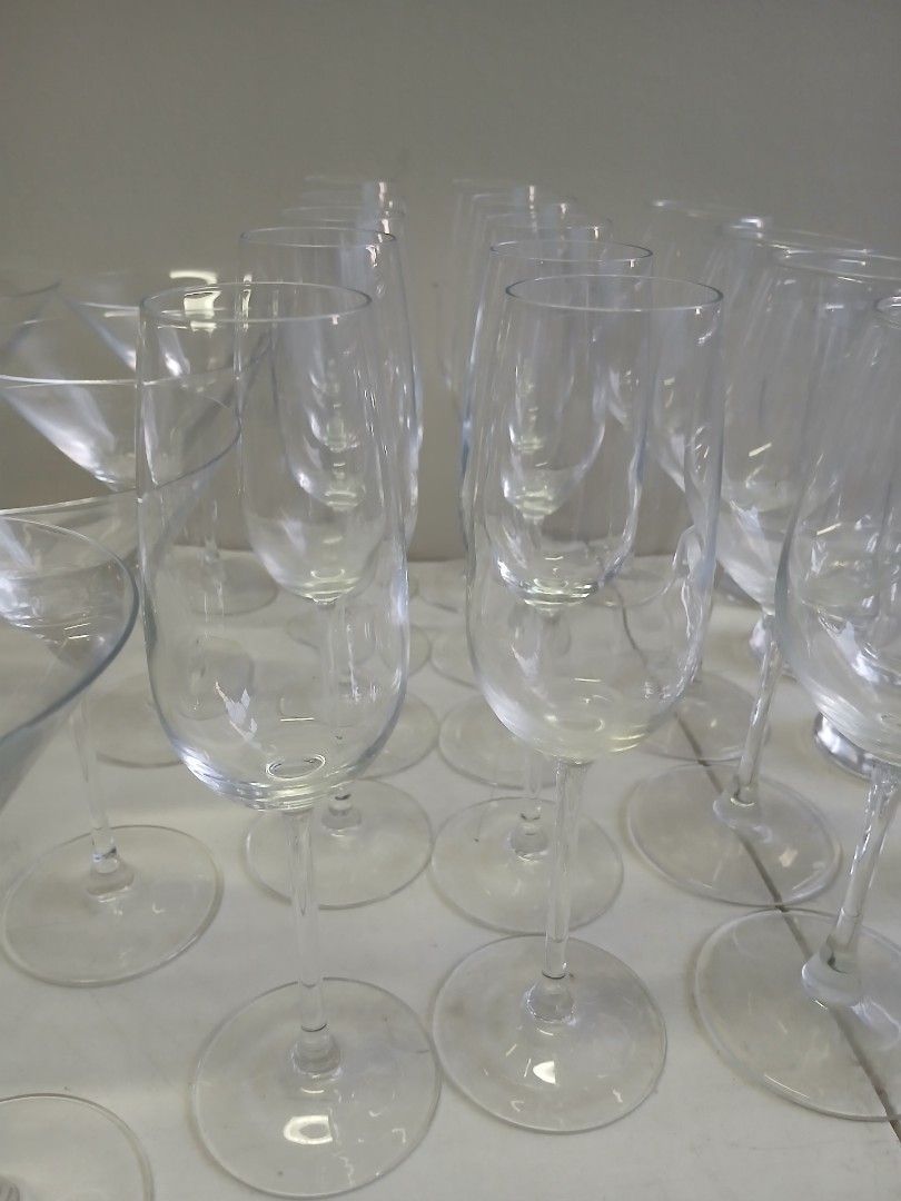 Wine and cocktail glass (Category: Coffee & Tea Tableware) located in Marikina City. Submitted by darthvader888 (Listing ID 1450204926, Image 2). Description: 25 pcs total 10 pcs- martini glass 15 pcs- chanpaigne glass no damage sold as a set.