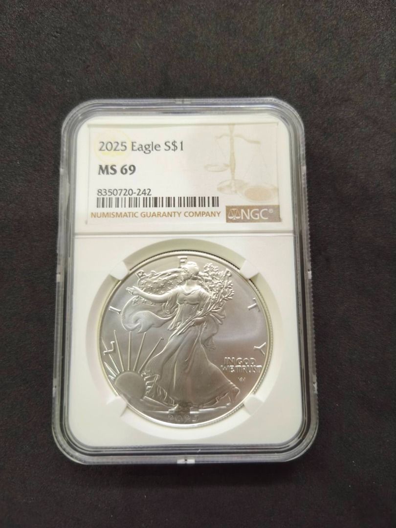 2025 American Eagle Silver Dollar NGC MS 69 (Category: Currency) located in Quezon City. Submitted by whiterabbitcollectibles (Listing ID 1450334846, Image 1). Description: - 2025 American Eagle Silver Dollar Coin - Graded MS 69 by NGC (Numismatic Guaranty Company) - Certified and encapsulated for protection - Contains 1 oz of .999 fine silver - Official coin of the United States - Excellent addition to any coin collection The American Silver Eag