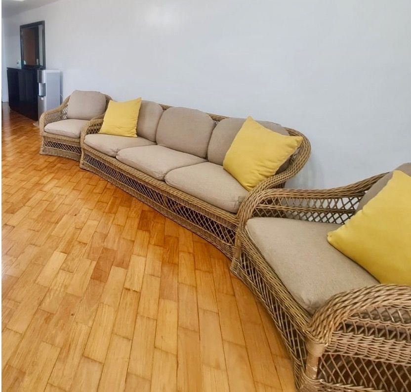 3-pc rattan sofa set with cushions (Category: Sofas) located in Makati City. Submitted by furmommah_3 (Listing ID 1450325454, Image 1). Description: 3-seater sofa with 2 arm chairs. Light brown rattan with beige cushions and yellow throw pillows. .