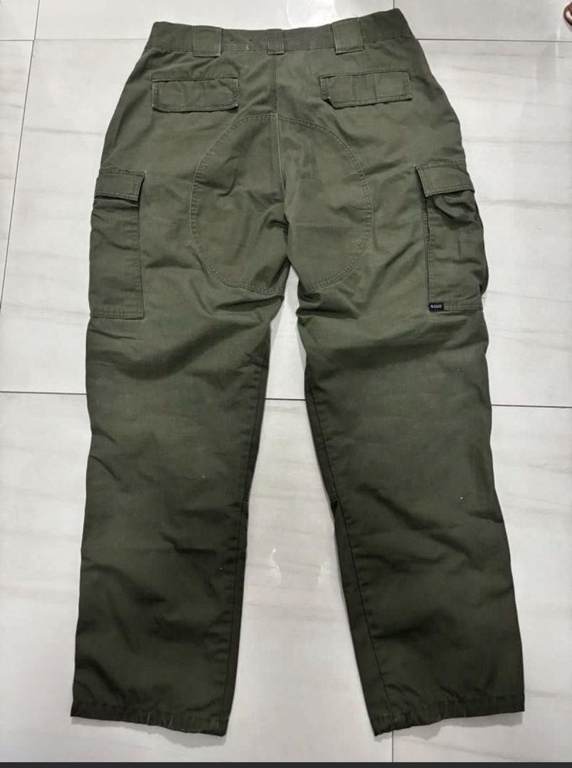 5.11 Tactical Cargo Pants - Olive Green Large (Category: Jeans) located in Quezon City. Submitted by edether (Listing ID 1450330638, Image 2). Description: - Olive green 5.11 Tactical cargo pants - Durable material built for tough use - Multiple pockets for ample storage Issue: slash on the left leg near the knee. Hindi sya tagos sa loob. Hindi butas Waist - 34in laying flat up to 39in with stretch Length- 42in Opening- 8.5in If you see it posted