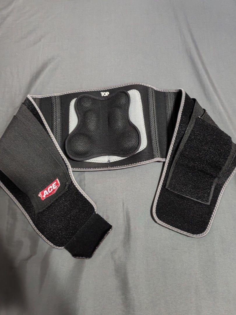 ACE Back Brace Lumbar Support Belt (Category: Braces, Support & Protection) located in Mexico. Submitted by kitty_go (Listing ID 1450325660, Image 2). Description: - ACE brand back brace for effective lumbar support. - Features adjustable straps for a customized fit. - Includes a padded insert for enhanced comfort. - Helps alleviate back pain and improve posture. - Simple to put on and take off. - Ideal for everyday wear or during physical activi
