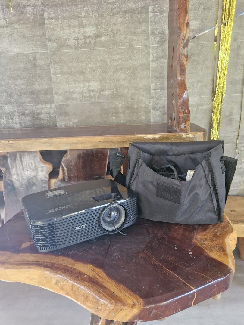 Acer Projector with Bag and HDMI (Category: Projectors) located in Lipa City. Submitted by sunchaser99 (Listing ID 1450417942, Image 3). Description: - Acer projector for sale - Includes original carrying bag - All necessary cables included - Ideal for presentations and movie nights - Tested and confirmed working - Ready for immediate use.