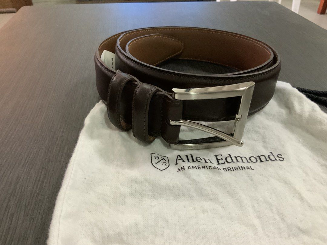 Allen Edmonds Brown Leather Belt with Silver Buckle (Category: Belts) located in San Fernando. Submitted by destinydeals04 (Listing ID 1450472393, Image 3). Description: - Classic brown leather belt from Allen Edmonds - Features a polished silver buckle - Comes with the original dust bag - Made in USA - Perfect for dressing up or down.