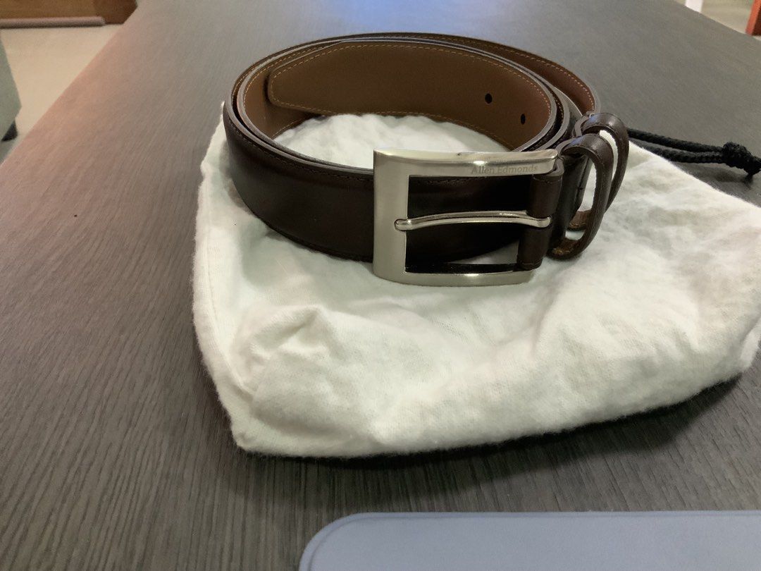 Allen Edmonds Brown Leather Belt with Silver Buckle (Category: Belts) located in San Fernando. Submitted by destinydeals04 (Listing ID 1450472393, Image 1). Description: - Classic brown leather belt from Allen Edmonds - Features a polished silver buckle - Comes with the original dust bag - Made in USA - Perfect for dressing up or down.