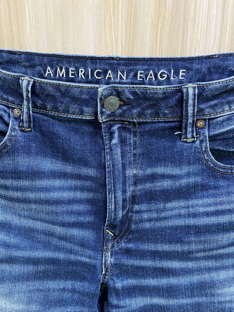 American Eagle Men's Blue Wash Jeans (Category: Jeans) located in Cebu City. Submitted by jhuyjoy (Listing ID 1450341735, Image 1). Description: American Eagle Men Slim Straight Jeans Size: US 38 x 32 (Can fit a 36"-waistline; length: 41") Color: Dark Blue Wash How it Fits Slim Straight cut Sits below your waist Composition and Details - 73% Cotton, 25% Recycled Cotton, 2% Elastane - Zip fly - 5-pocket styling - AirFlex: Authentic denim look with
