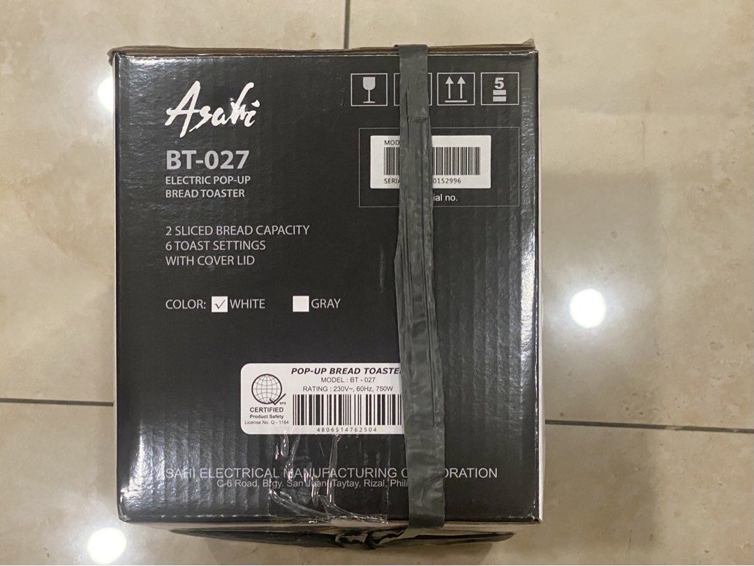 Asahi Electric Pop-up Bread Toaster (Category: Ovens & Toasters) located in Pasay City. Submitted by kkalien (Listing ID 1450428980, Image 2). Description: Asahi Electric Pop-up Bread Toaster BT-027 Pop-Up Bread Toaster 2 bread slice capacity Color: White 750W 6 toasting settings Stainless steel top plate Cord winder storage Easy open hinged crumb trays With cover Double insulated AC cord Dimensions: 25 x 14.6 x 16.8 cm (L x W x H) The shipping f