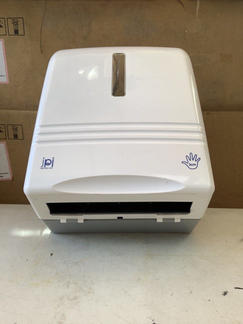 Automatic Jumbo Tissue Roll Dispenser with Adaptor or Battery Operated (Category: Pitchers & Dispensers) located in Paranaque City. Submitted by seb_trading (Listing ID 1450346408, Image 3). Description: clearance sale, was used as a demo unit, only minor scratches, no damage auto dispensing takes 7 to 8 jumbo tissue paper roll battery operated but comes with a power adaptor good condition last price Paranaque area.