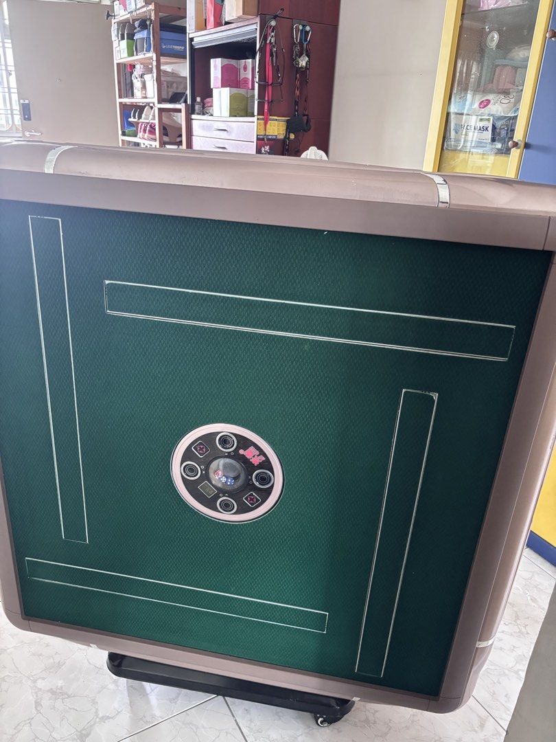 Automatic Mahjong Table (elevator) (Category: Tables & Sets) located in Singapore. Submitted by bejolly (Listing ID 1450367379, Image 1). Description: Not for fussy people. Used it to play once a week. Everything still works fine. Comes with two sets of tiles with no Fei. Please arrange for own delivery..