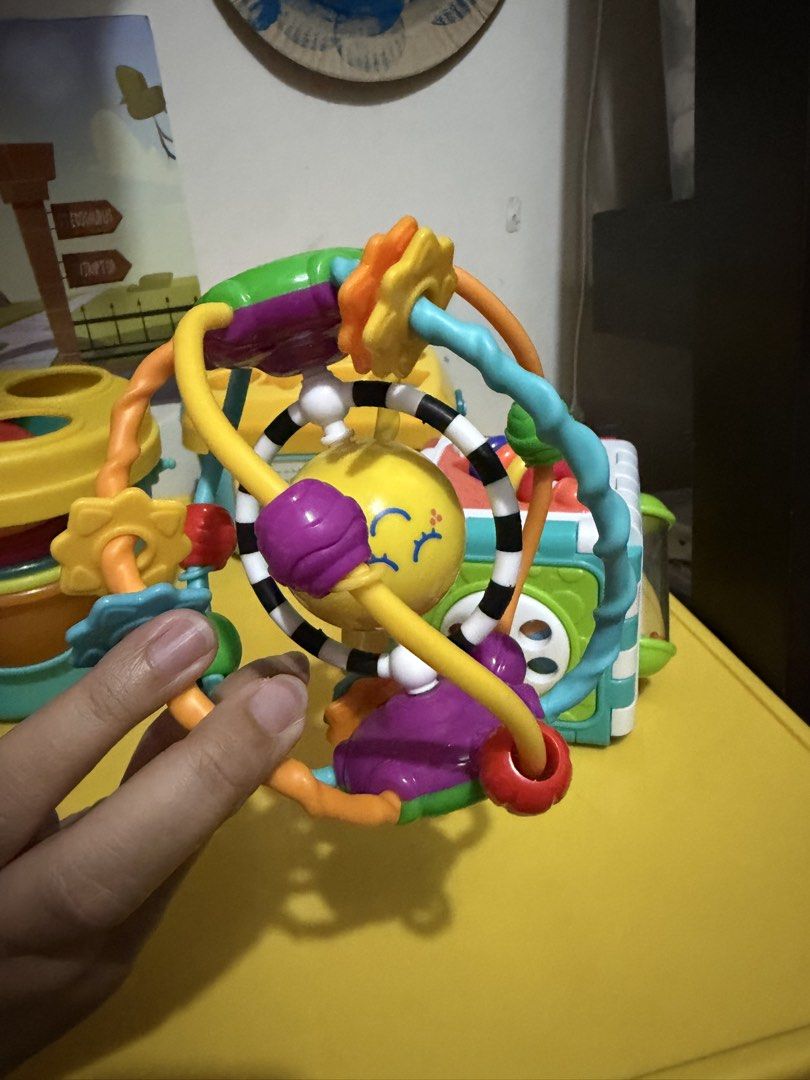 Baby Activity Toys Bundle - Stacking Cups, Shape Sorter, Activity Cube (Category: Infant Playtime) located in Pasig City. Submitted by etcyshop (Listing ID 1450348605, Image 3). Description: Preloved Batch 1 Kids educational toys for 18mos- 3y/o Item #1 Little Learner Activity Sensory Ball- colorful developmental toy featuring a central spinning face and easy-grasp textured rings. 150 Item #2 6-sided activity cube, designed to help toddlers devel