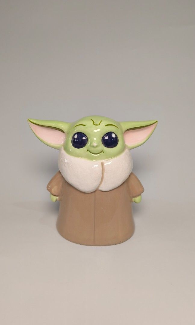 Baby Yoda Starwars set (Category: Figurines & Statues) located in Cavite. Submitted by phtmt (Listing ID 1450448866, Image 3). Description: Coinbank (see photos for condition) H 6 inches L ear to ear 6.5 inches W 10 inches Small yoda H 2.7 inches L ear to ear 6.4 inches W 2.6 inches.