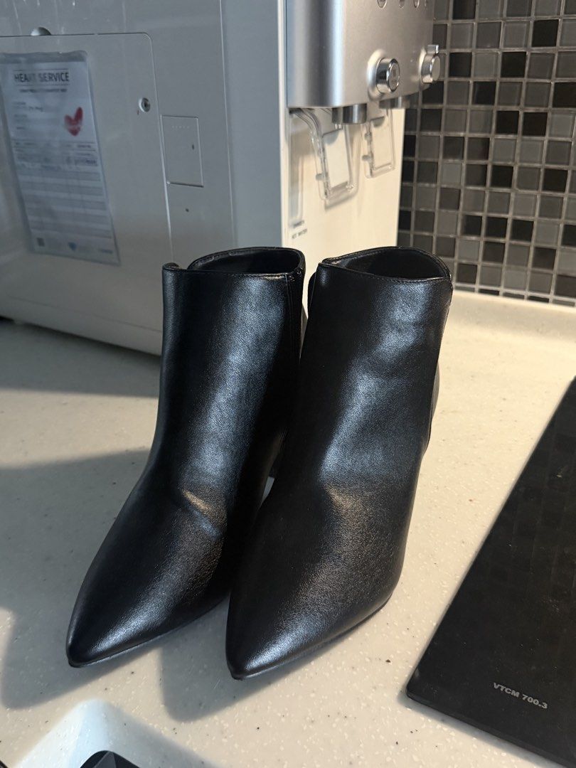 Black Pointed Toe Block Heel Ankle Boots (Category: Boots) located in Kuala Lumpur. Submitted by tengg1298 (Listing ID 1450403314, Image 2). Description: - Black ankle boots - Pointed toe - Block heel - Side zipper for easy wear - Versatile for dressing up or down - Ideal for work or a night out.